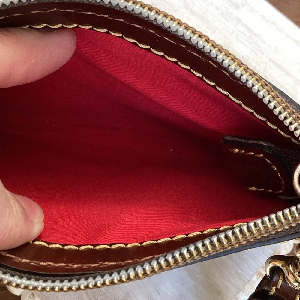 Dooney & Bourke pebbled deep purple and Brown Leather Wristlet, keychain